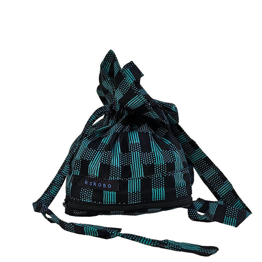 Sac artisanal en tissu africain, fabriqué vegan. Slow fashion de créateur.