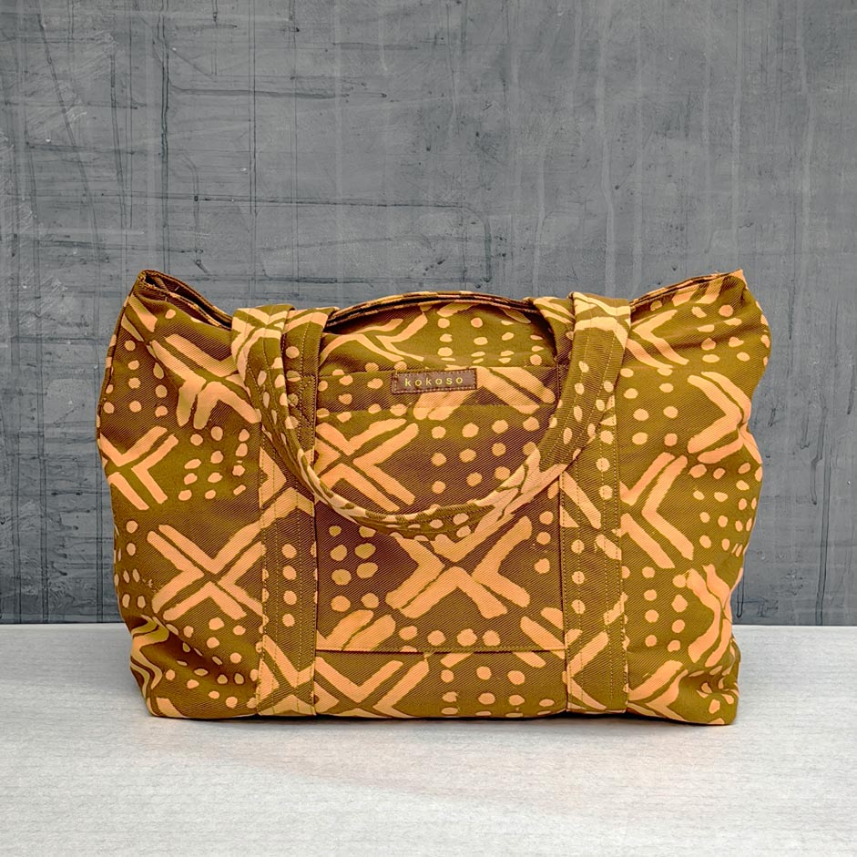 Sac en coton à motif coloré, mode éthique et fabrication artisanale.
