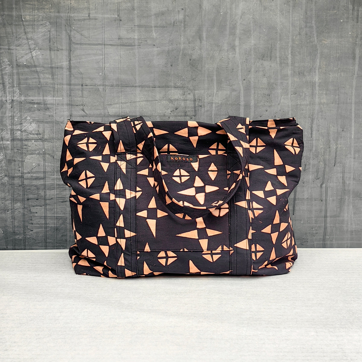 Sac en coton à motif coloré, mode éthique et fabrication artisanale.