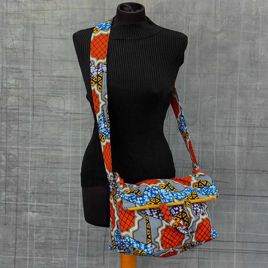 Sac en bandoulière avec motifs oranges, bleus et violets