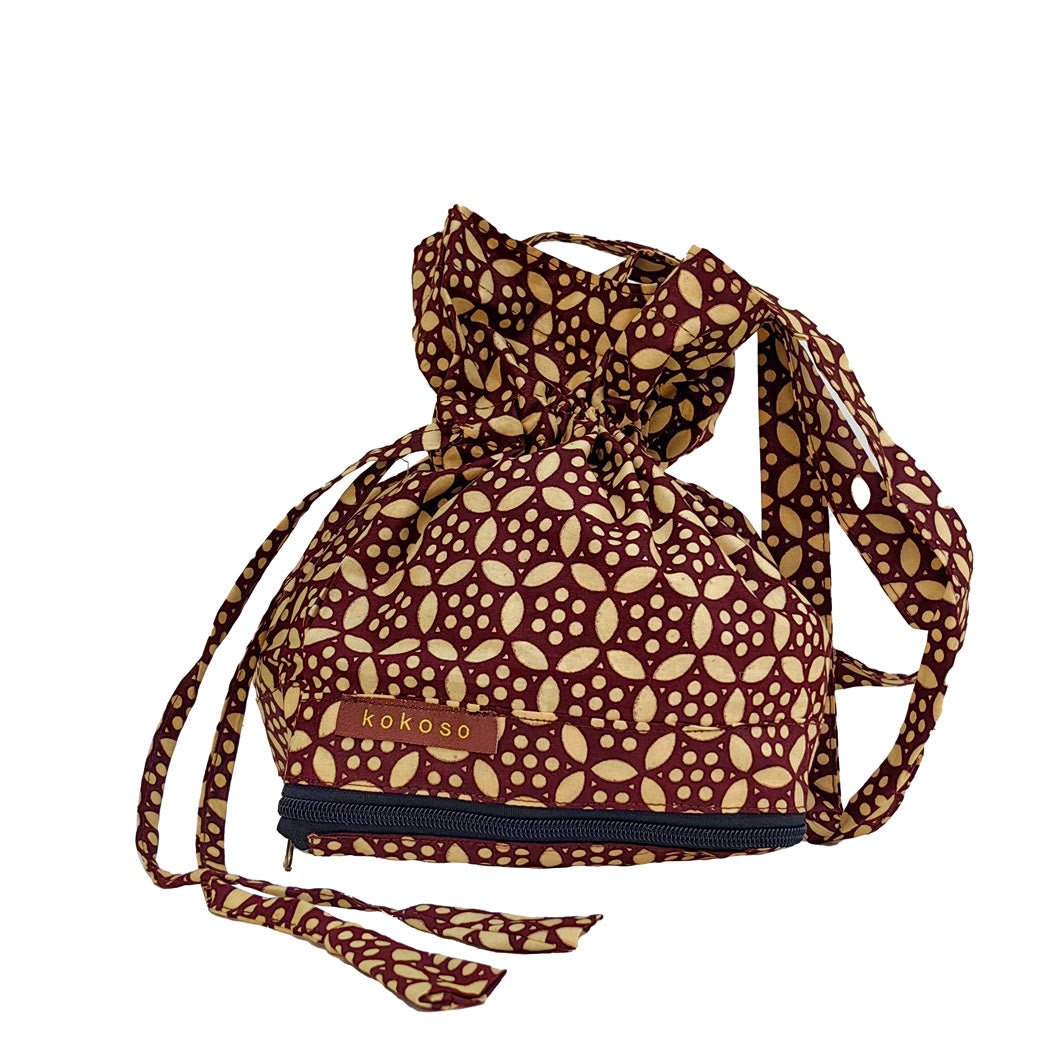 Sac artisanal en tissu africain, fabriqué vegan. Slow fashion de créateur.