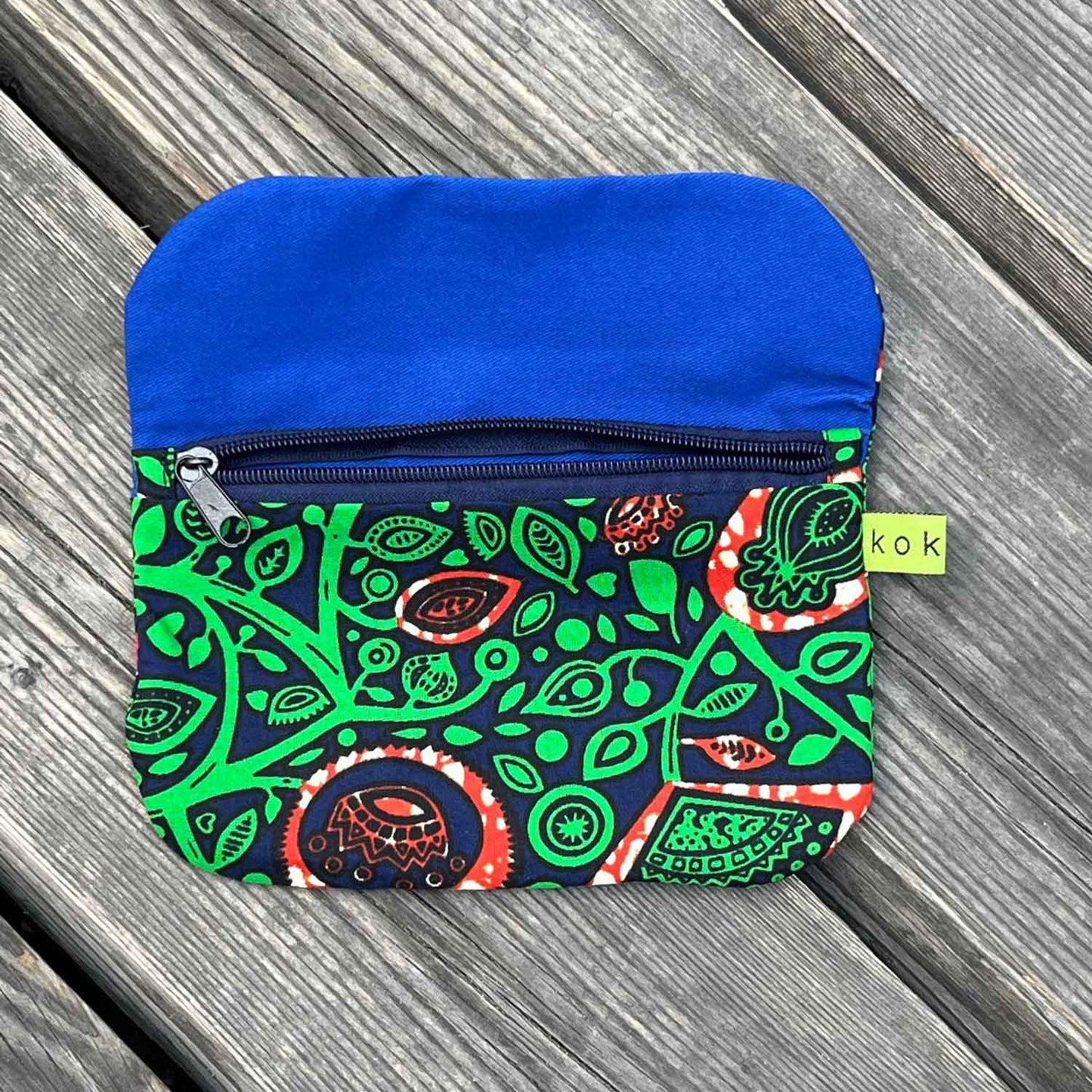 La pochette verte ouverte
