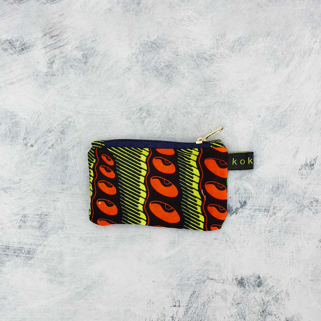 Pochette en tissu Wax, format compact et fait main. Idée cadeau pour femme.