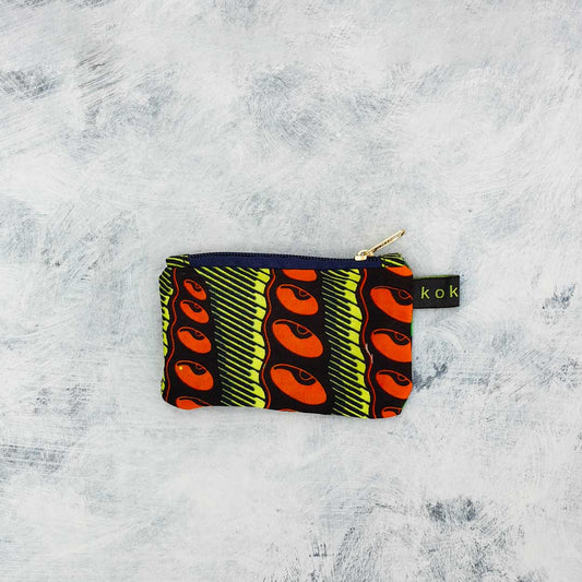 Pochette en tissu Wax, format compact et fait main. Idée cadeau pour femme.