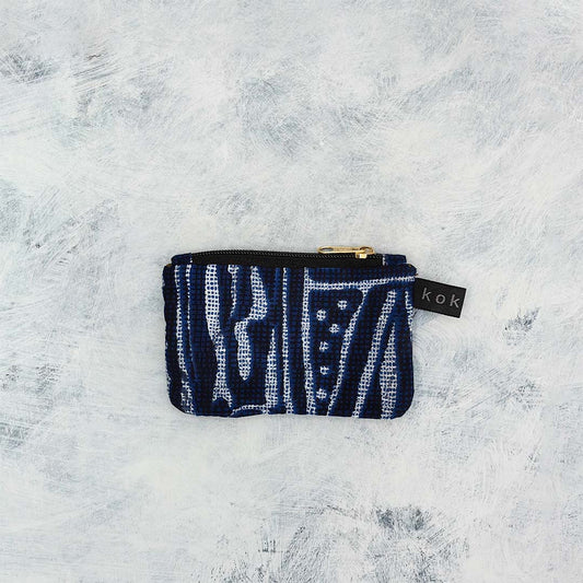 Pochette en tissu Wax, format compact et fait main. Idée cadeau pour femme.