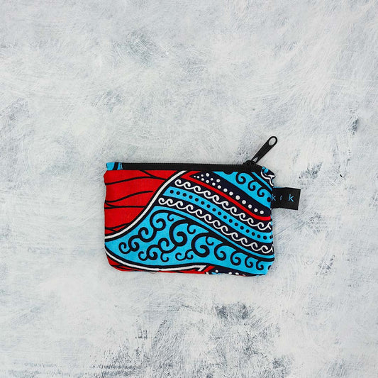 Pochette en tissu Wax, format compact et fait main. Idée cadeau pour femme.