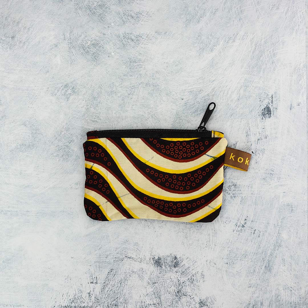 Pochette en tissu Wax, format compact et fait main. Idée cadeau pour femme.