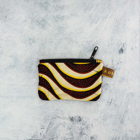 Pochette en tissu Wax, format compact et fait main. Idée cadeau pour femme.