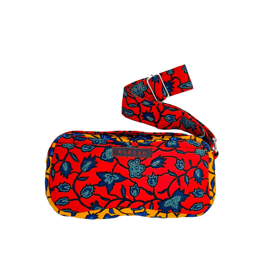 Petite sacoche faite main par Zoumana Sanou avec motifs floraux, en wax