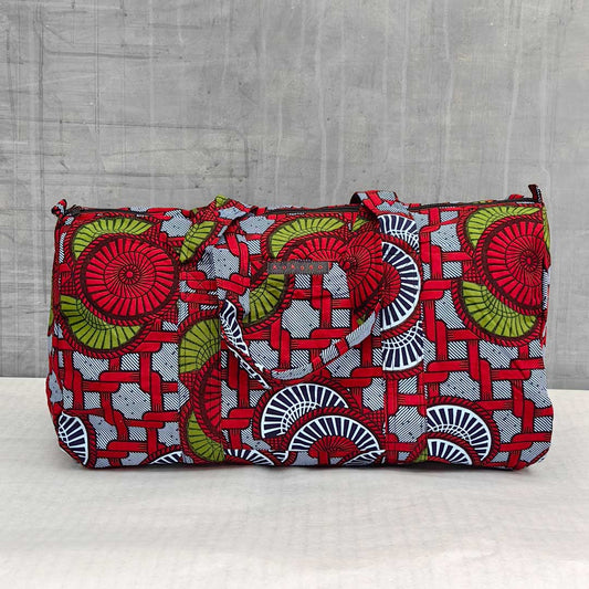 sac de voyage en wax à motifs rouges