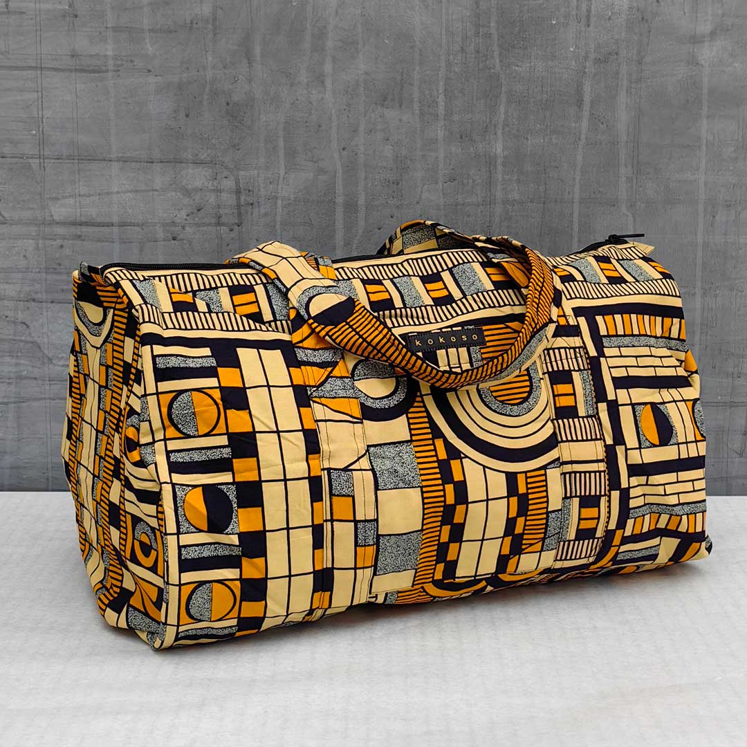 sac de voyage en wax à motifs géométriques jaunes