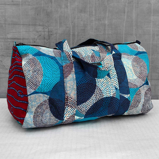 sac de voyage en wax à motifs bleus 