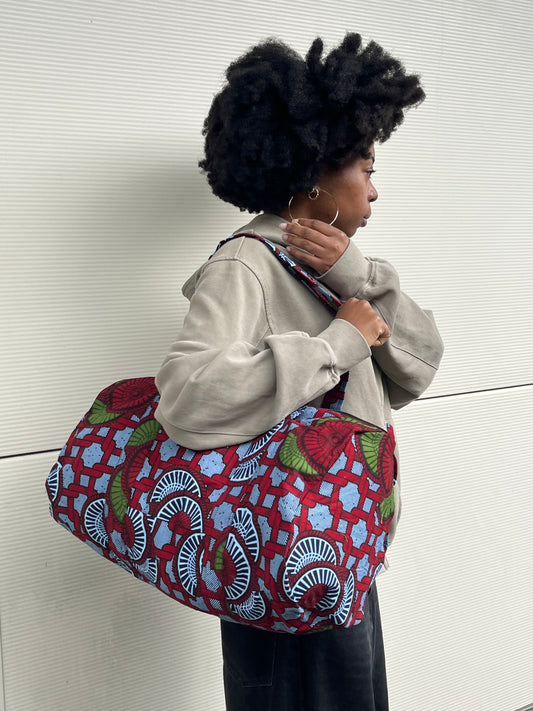 sac de voyage en wax à motifs rouges