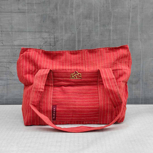 sac en Faso Dan Fani rose rayé blanc avec poche intérieure