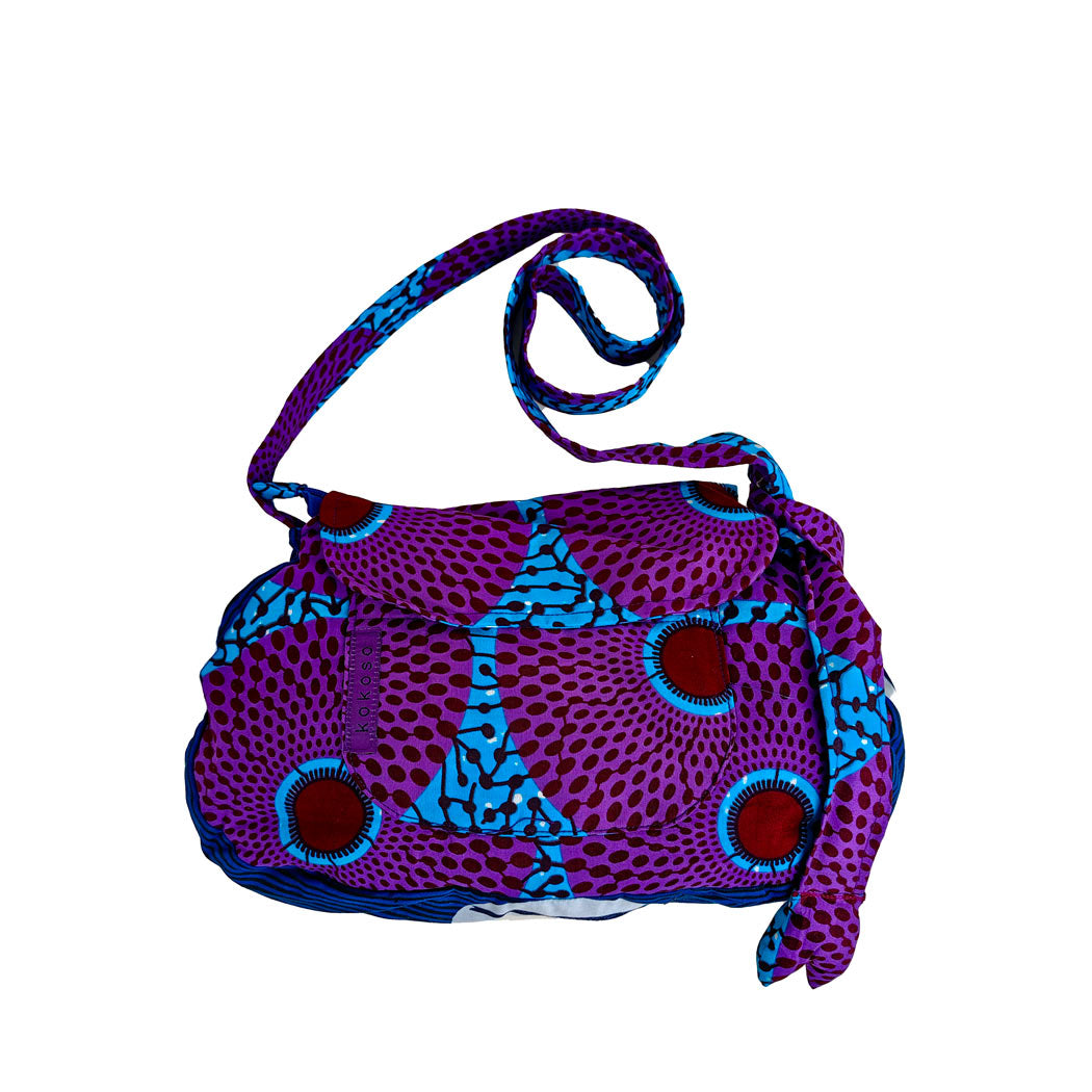 sacoche en WAX bleu clair avec motifs circulaires violets