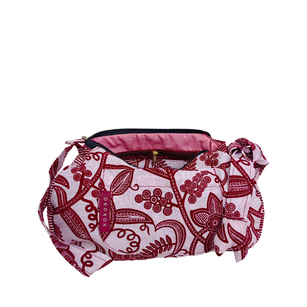 sacoche en WAX rose avec motifs floraux