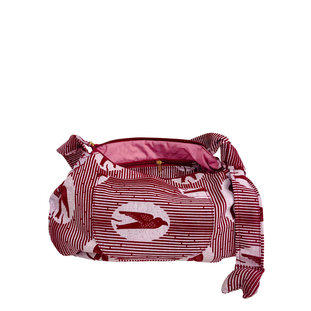 sacoche en WAX rose avec motifs floraux